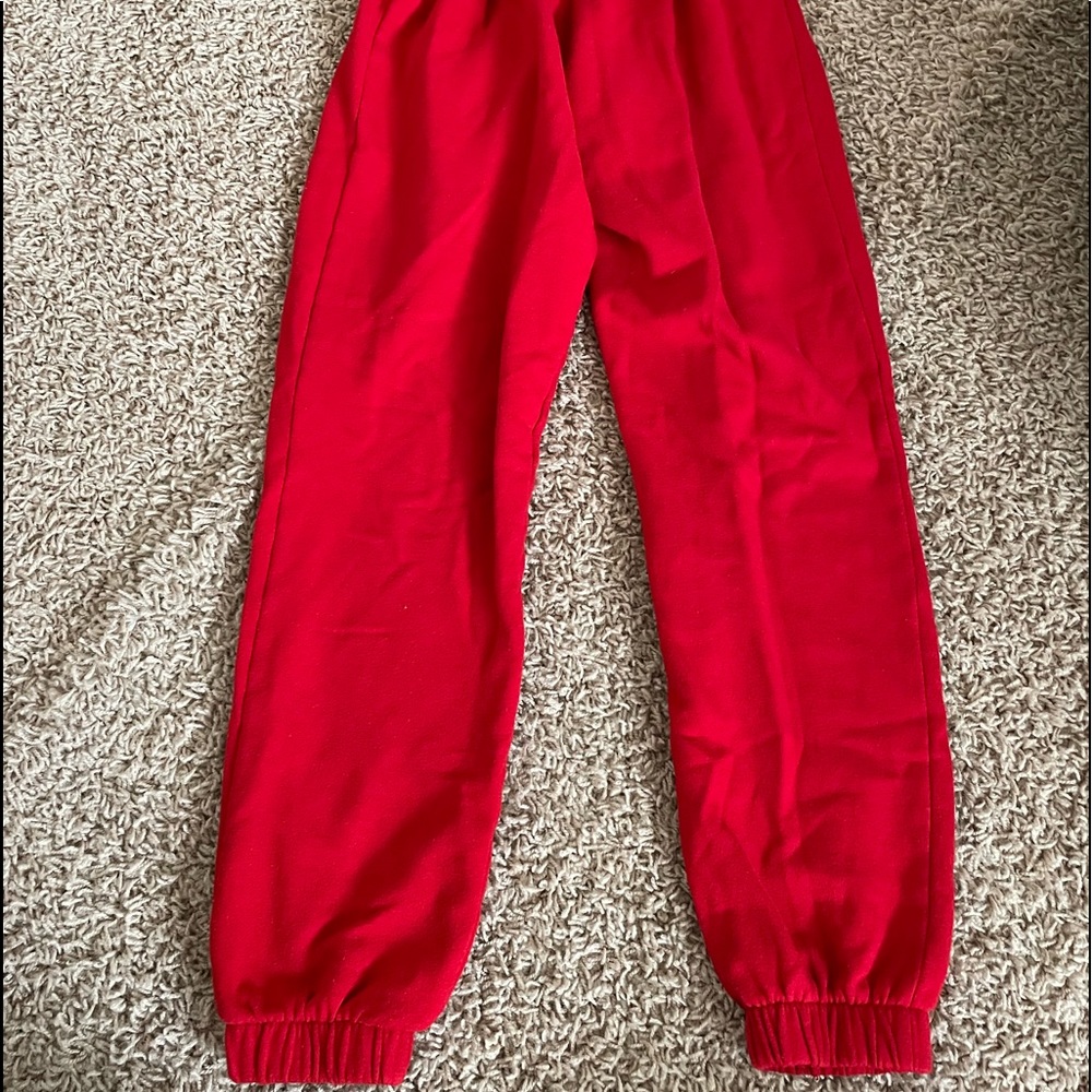 red sweatpants